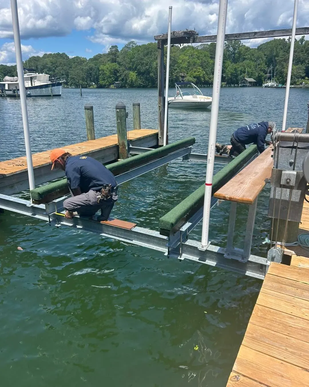 Crew fitting new bunks from the water