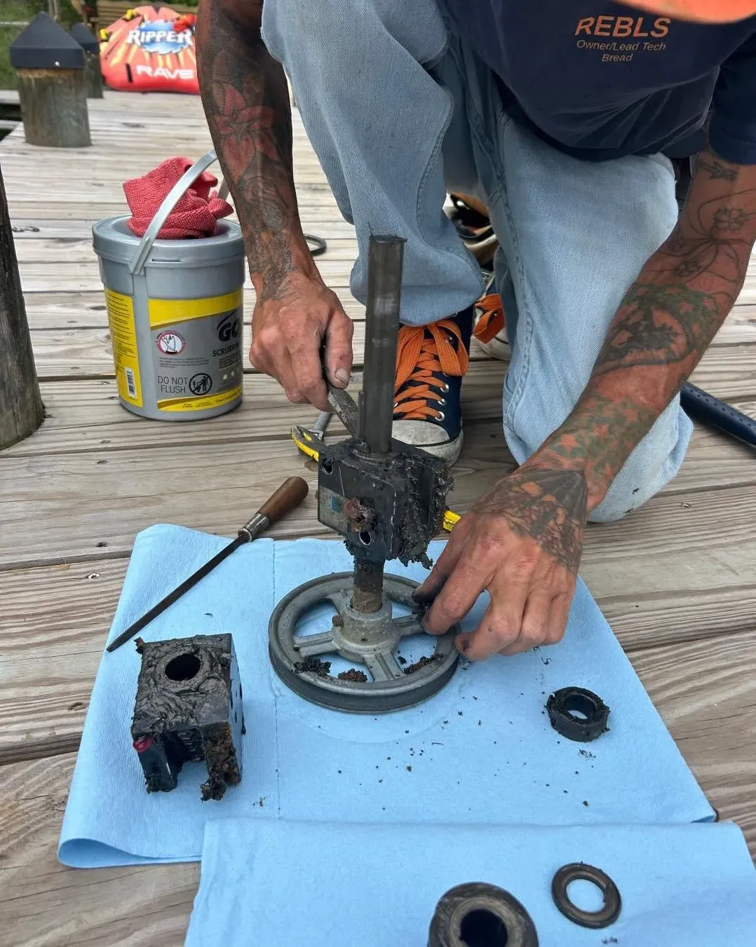 REBLS technician rebuilding a lift gearbox on the dock