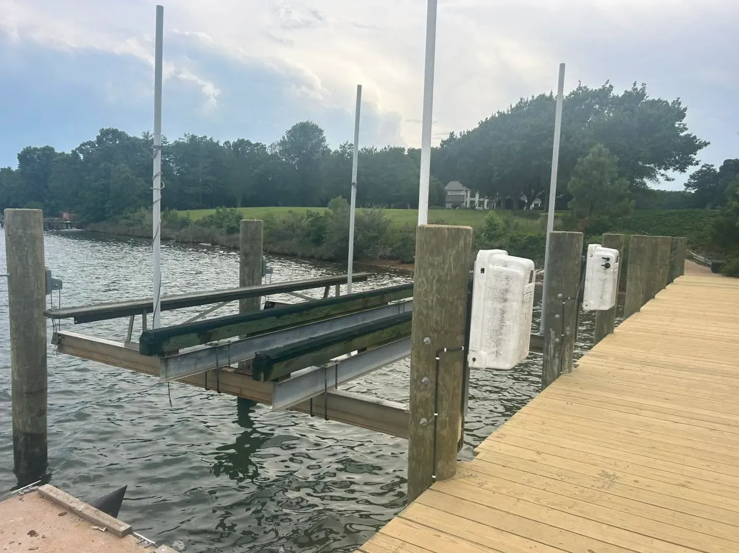 New boat lift frame installed between pilings at a Southern Maryland pier